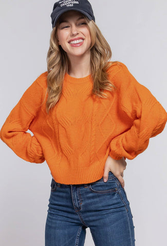 Orange cable sweater